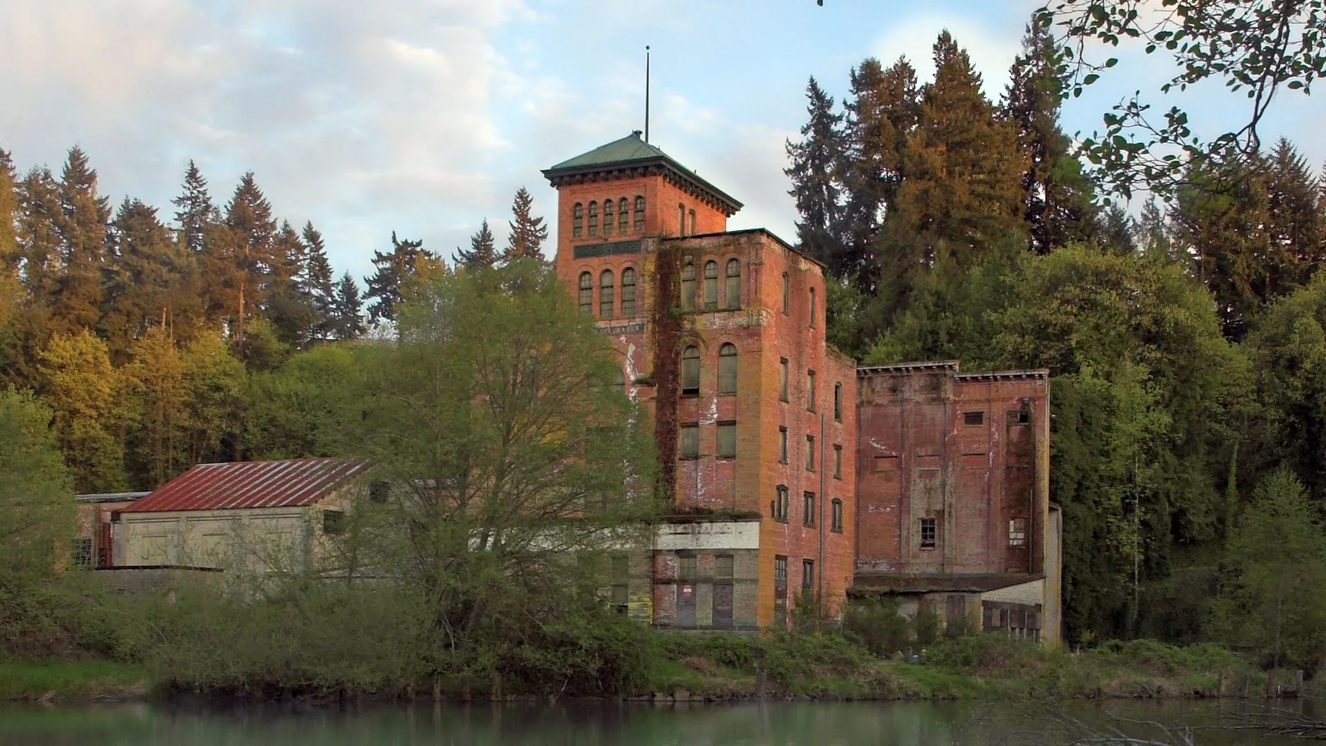 The 1906 Olympia Brewery tower viewed from across the Deschutes River in autumn